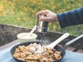 How to dust kaiserschmarrn with powdered sugar