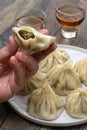 how to eat Georgian khinkali dumplings