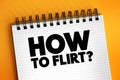 How To Flirt? text on notepad, concept background Royalty Free Stock Photo