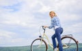 How to learn to ride bike as an adult. Active leisure. Girl ride bicycle. Healthiest most environmentally friendly and Royalty Free Stock Photo
