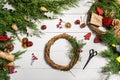 How to make christmas door wreath. The working process. The decorator`s workplace. Top view