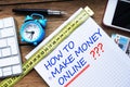 How to make money online question handwritten on math book Royalty Free Stock Photo