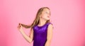 How to make tidy hairstyle for kid. Ballroom latin dance hairstyles. Kid girl with long hair wear dress on pink