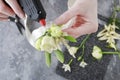 How to make wrist corsage for bride using rose and eustoma flowers Royalty Free Stock Photo