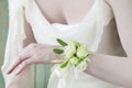 How to make wrist corsage for bride using rose and eustoma flowers Royalty Free Stock Photo