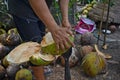 How to peel coconut Thai style Royalty Free Stock Photo