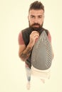 How to properly use steam iron. Man bearded hipster hold electric ironing tool. How iron clothes correctly. Guy with Royalty Free Stock Photo