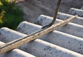 How to pull out the nails correctly from asbestos old roof tile