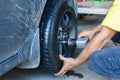 How to remove the tire from the car Alloy Wheels. Royalty Free Stock Photo