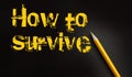 How to survive words and yellow pencil besides. Survival plan concept