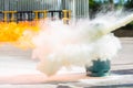 How to use a fire extinguisher with gas container. Royalty Free Stock Photo