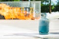 How to use a fire extinguisher with gas container. Royalty Free Stock Photo