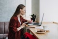 How to work more productively. Young woman student, freelancer working with laptop Royalty Free Stock Photo