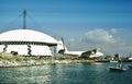 Howard Hughes Spruce Goose Hercules HK-1 N37602 CN 1 H-4 being moved into a dome next to the HMS Queen Mary at the Port of Long