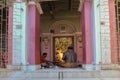 Hindu Purohit raising fire of yajna to worship Goddess Durga for Ashtami puja aarati