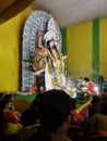 A priest performing a traditional puja at family atmosphare.