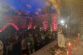 Hindu Bengali devotees praying to Goddess Durga while Purohit worshipping Goddess. Ashtami puja aarati - sacred Durga Puja ritual Royalty Free Stock Photo