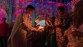 Hindu devotees sharing divine blessings of Goddess Durga, Durga Puja festival