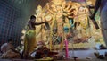 Hindu Priest worshipping Goddess Durga with chamor, fly whisk fan