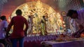 Howrah, West Bengal, India - 5th October, 2022 : Hindu Purohits offering Vog, holy sweet food to Goddess Durga while Dhaakis