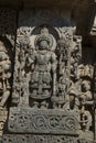 Sculpture and frieze on the outer walls of Hoysaleswara Temple at Halebidu , Karnataka, India