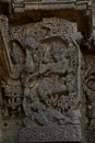 Sculpture and frieze on the outer walls of Hoysaleswara Temple at Halebidu , Karnataka, India