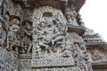 Hoysaleswara temple wall carved with incarnation of lord vishnu as Narasimha killing the demon king Hiranyakashipu