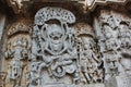 Hoysaleswara Temple wall carving of lord Narasimha killing the demon king or evil tyrant Hiranyakashyap