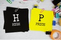HP - High Price text on stick note with stationery on concrete background Royalty Free Stock Photo