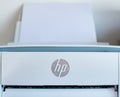 HP logo brand on digital modern printer front view