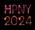 2024 (HPNY) happy new year fireworks celebration written sparkling at night Royalty Free Stock Photo