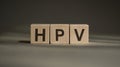 HPV Human Papillomavirus acronym on wooden cubes Royalty Free Stock Photo