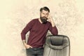 HR department. Empty chair. Bearded boss stand in office. Job offer. Guy thinking. Business decision. Office worker Royalty Free Stock Photo