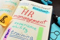 HR human resource management. Note and pen. Royalty Free Stock Photo