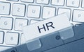 HR - Human Resources - folder with text on computer keyboard Royalty Free Stock Photo