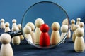 HR human resources and Recruitment. Wooden figures and magnifying glass Royalty Free Stock Photo