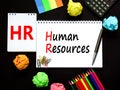 HR Human resources symbol. Concept words HR Human resources on white note. Metallic pen, calculator, pencil. Beautiful black Royalty Free Stock Photo