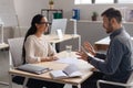 HR manager interviewing potential employee at modern company office. Personnel recruitment, corporate headhunting Royalty Free Stock Photo