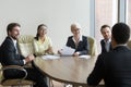 Hr managers laugh at joke of applicant at job interview Royalty Free Stock Photo