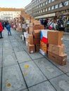 Hradec Kralove, Czech Republic - November 17, 2019: People rebuilding wall of boxes from 1989