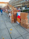 Hradec Kralove, Czech Republic - November 17, 2019: People rebuilding wall of boxes from 1989