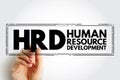 HRD Human Resource Development - improving the effectiveness of organizations and the individuals and teams, acronym text stamp Royalty Free Stock Photo