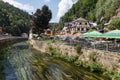 HRENSKO, CZECH REP - JULY 19, 2020. Hrensko and river Kamenice on the Czech-German border with amazing sandstone pillars behind,