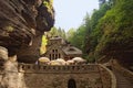 Medieval building between the rocks in the forest. Bohemian Switzerland national park Royalty Free Stock Photo