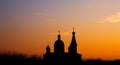 the hristian Church at orange sunset with cloud Royalty Free Stock Photo