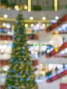 ÃÂ¡hristmas tree in shopping mall, defoused holiday background Royalty Free Stock Photo