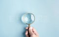 HRM or Human Resource Management, Magnifying glass focus to resume icon Royalty Free Stock Photo