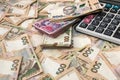 500 hryvnia bills with calculator  as background. Close up. Top view Royalty Free Stock Photo
