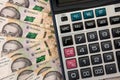 500 hryvnia bills with calculator  as background. Close up. Top view Royalty Free Stock Photo