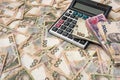 500 hryvnia bills with calculator  as background. Close up. Top view Royalty Free Stock Photo